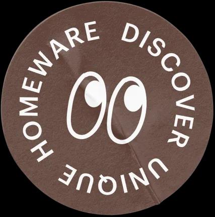Brown sticker with Discover Unique Homeware text